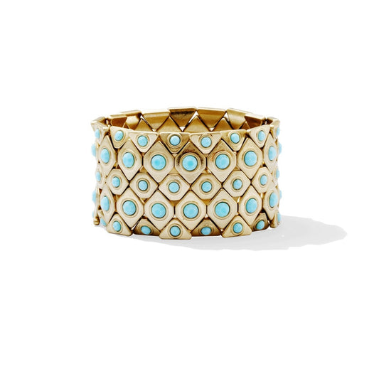 Turquoise-colored beads on a gold stretchy bracelet