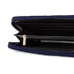 Black interior of navy zippered wallet with gold zipper