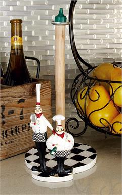 Two smiling chefs atop a checkboard base and paper towel holder
