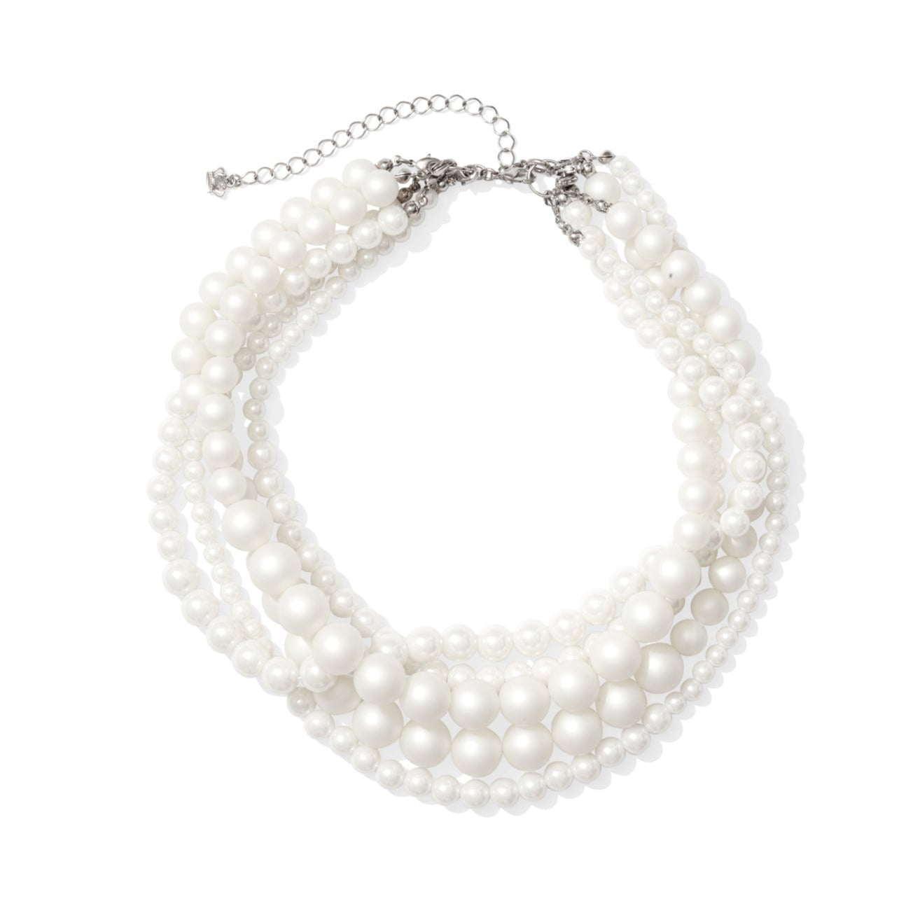 Three shiny and two matte strands of faux pearls with a silver clasp