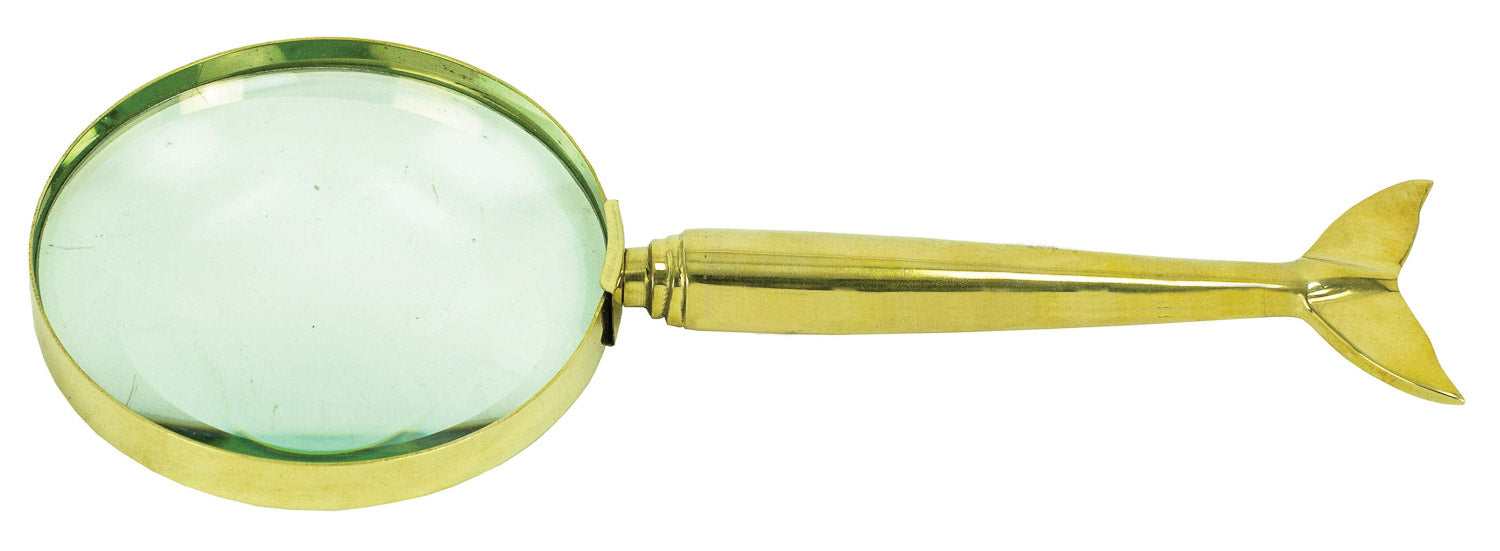 Brass magnifying glass with whale tail