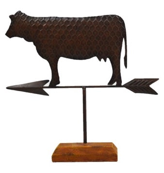 Cow mounted on wood platform and cast iron weathervane
