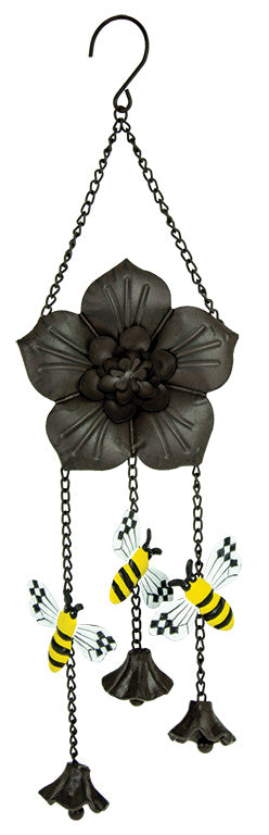 Hanging bells contain a black metal flower with hanging yellow bees and small bell flowers