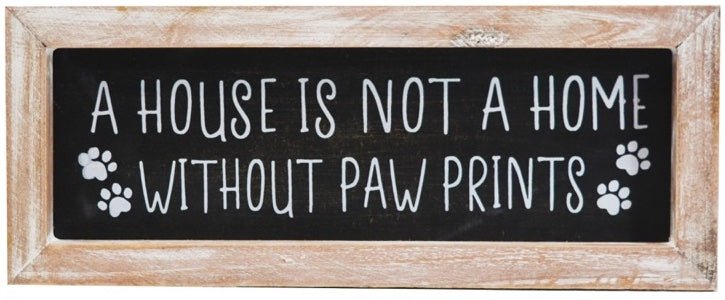 Black chalkboard style sign reading "A House Is Not A Home Without Paw Prints"
