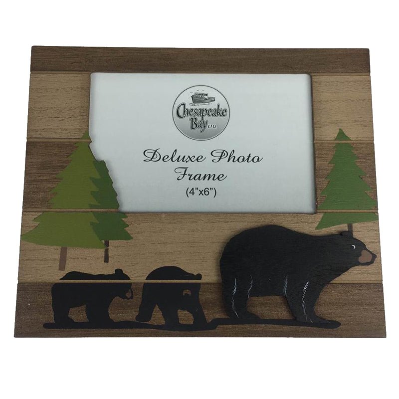 Mama bear and two cubs photo frame in the forest