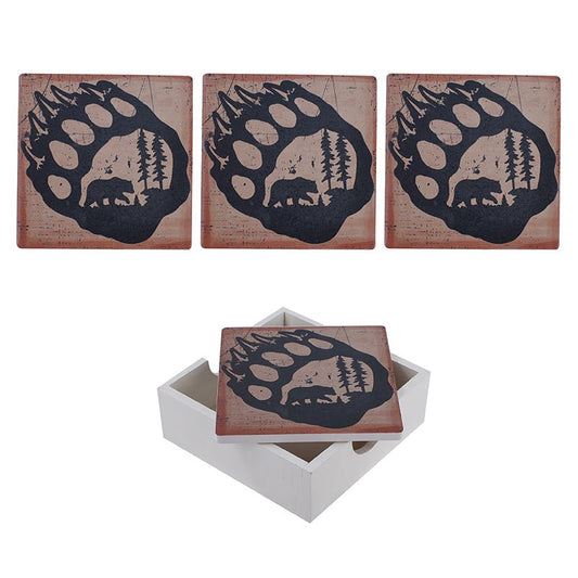 Bear paw coasters with bear silhouettes in the forest
