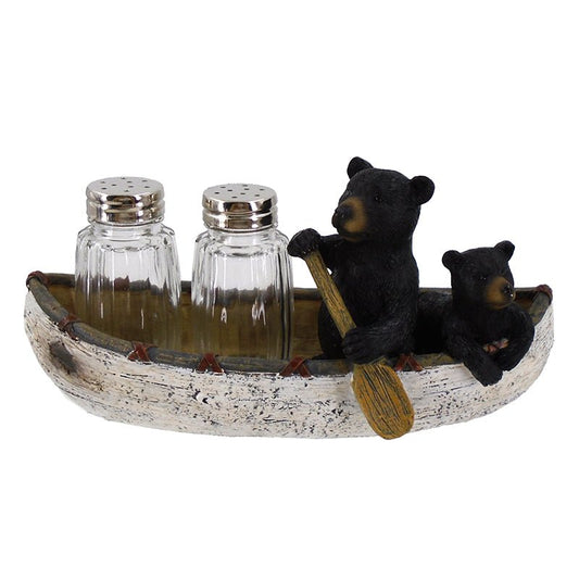Salt and pepper shaker in a canoe with a mama bear and cub