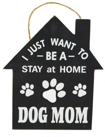 "I Just Want To Be A Stay At Home Dog Mom" wood sign on a jute rope with black background, paw prints and white writing